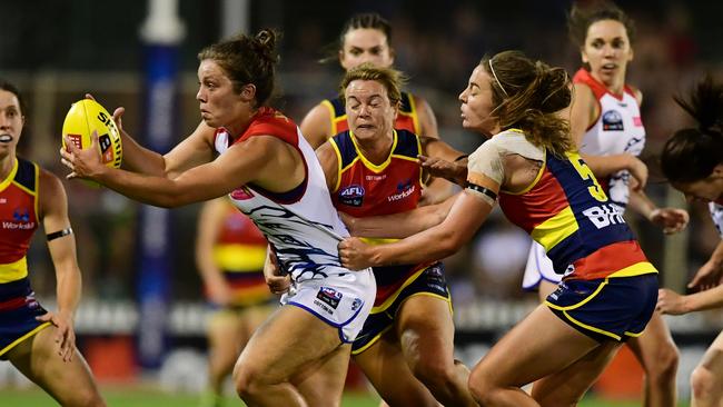 Ellie Blackburn of the Western Bulldogs tries to find some space against the Crows on Saturday. Picture: AAP Image/Mark Brake