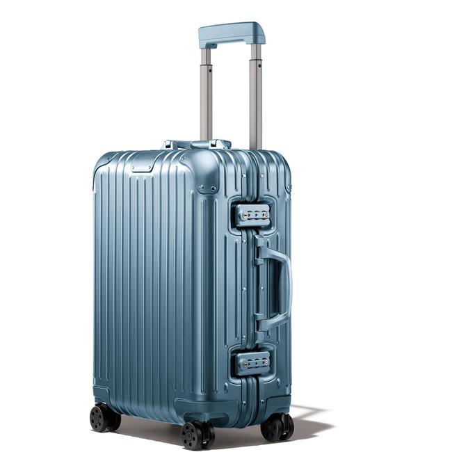 A Rimowa carry-on is the only suitcase that Godfrey takes on planes.