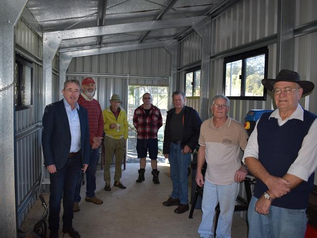 MEN'S BUSINESS: Page MP Kevin Hogan with members of the Dunoon Men's Shed in the shed's extension