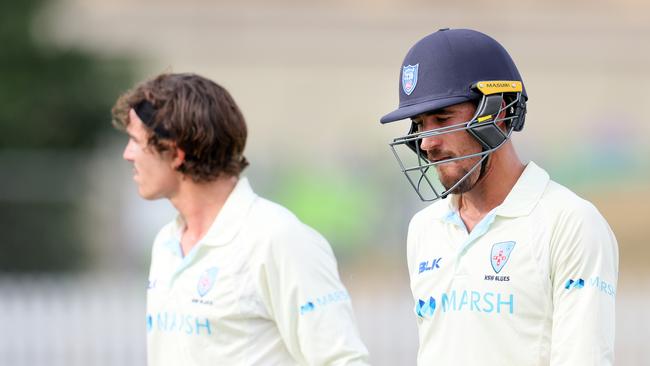 A frustrated Mitch Starc heads from the field after NSW declared.