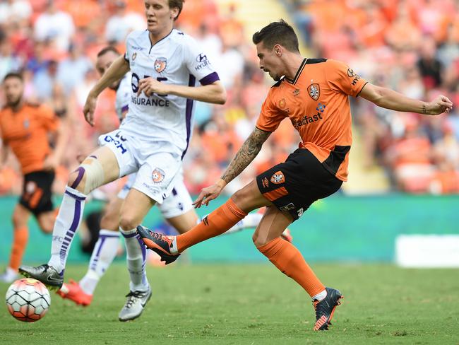 Jamie Maclaren of the Roar shoots and scores against Perth Glory.