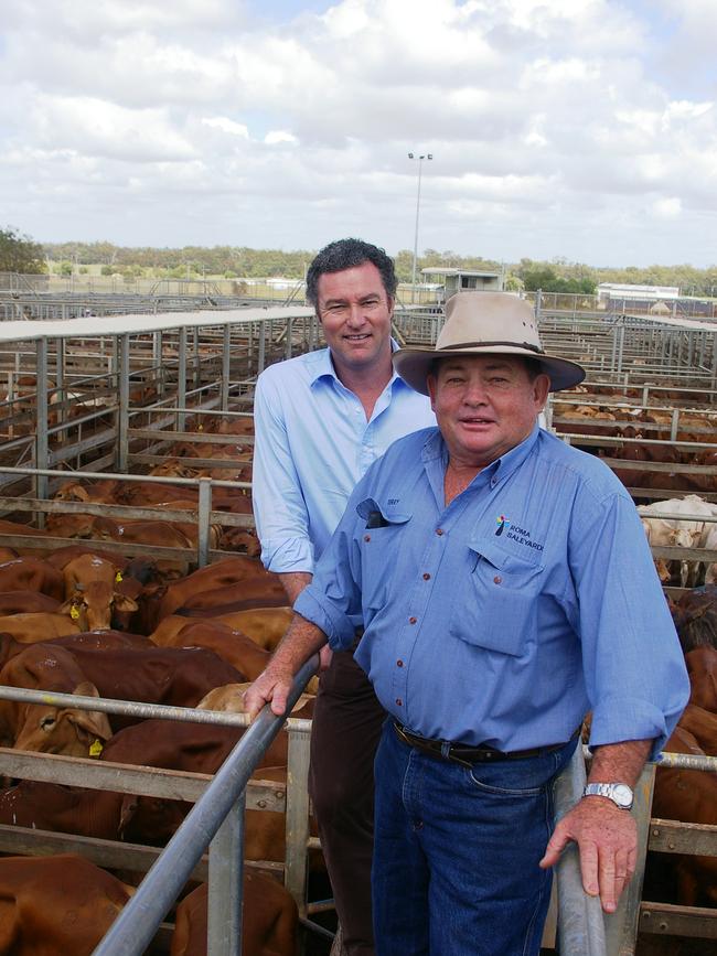 Former LNP leader John-Paul Langbroek in 2010 at the Roma Saleyards with operations manager Terry Hyland. Picture: Martin Bunyard