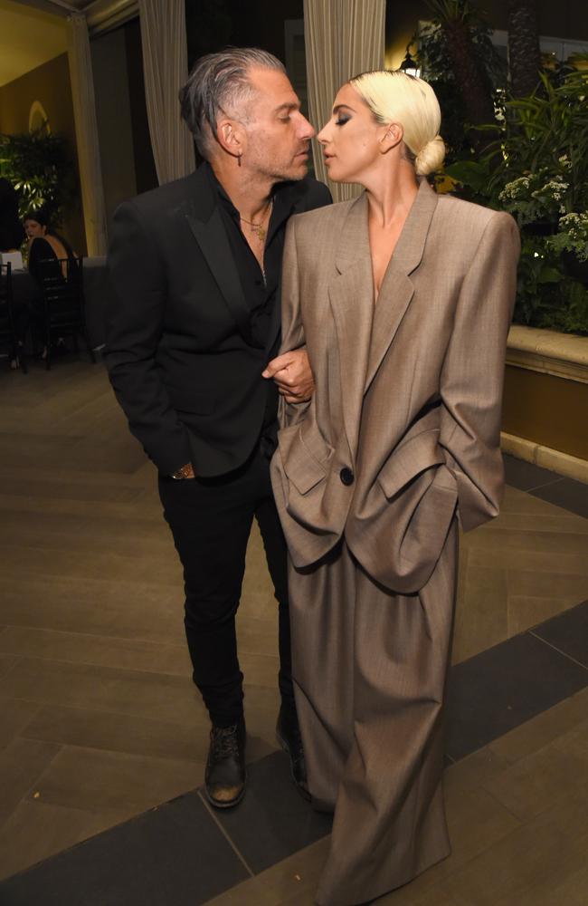 Christian Carino and Lady Gaga attend ELLE's 25th Annual Women In Hollywood Celebration last year. Picture: Getty