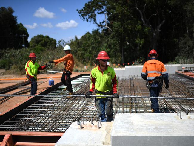 TOWNSVILLE , AUSTRALIA - NewsWire Photos - OCTOBER 21, 2020.Construction workers at the Haughton River bridge construction site on the Bruce Highway, south of Townsville. Queensland Premier Annastacia Palaszczuk visited the site while on the election campaign trail. Picture: NCA NewsWire / Dan Peled