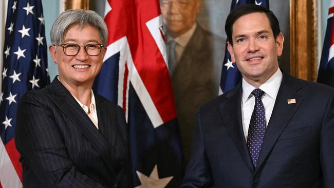 US Secretary of State Marco Rubio and Australian Foreign Minister Penny Wong shake hands as they meet at the State Department in Washington, DC, on January 21, 2025. (Photo by ANDREW CABALLERO-REYNOLDS / AFP)