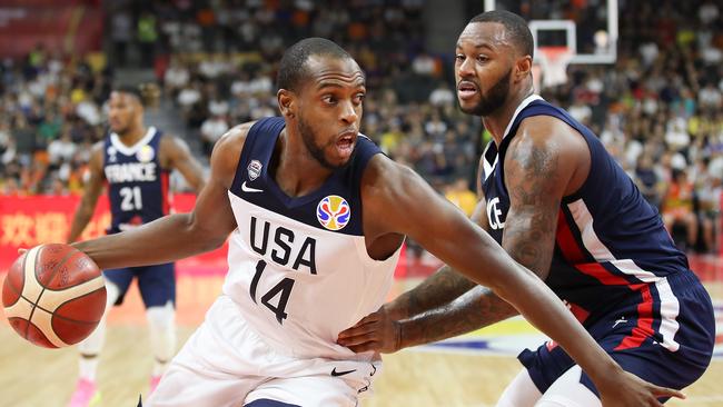 Team USA’s Khris Middleton tries to get past France’s Amath M'Baye. Picture: Getty Images