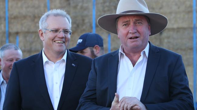 Prime Minister Scott Morrison making a drought announcement with Barnaby Joyce at Royalla, outside Canberra, yesterday. Picture: Kym Smith.