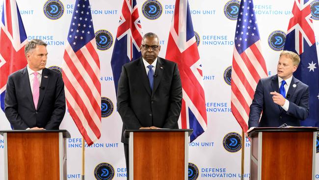 Richard Marles, US Defense Secretary Lloyd Austin and British Defense Secretary Grant Shapps speak to reporters about AUKUS in California. Picture: AFP.