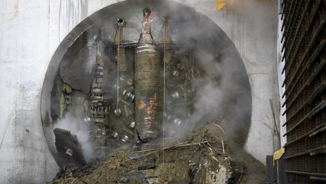 Still of Metro Tunnel boring machine breaking through at Parkville.