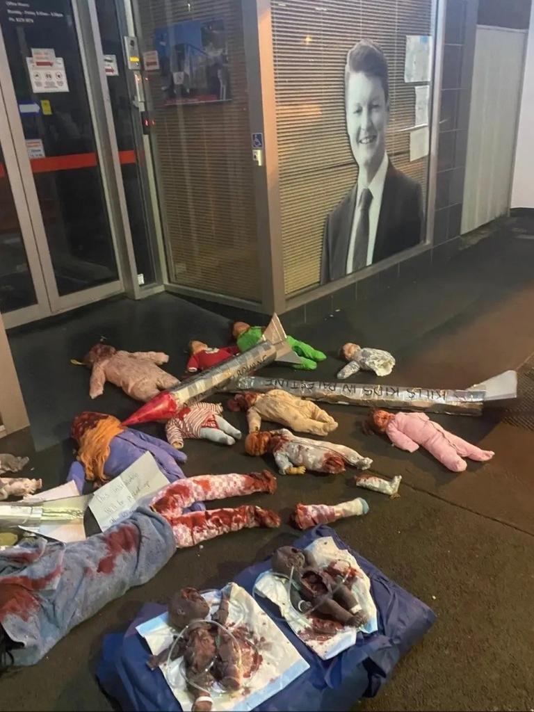 Bloodied dolls and fake missiles left outside the office of deputy premier Ben Carroll. Picture: supplied