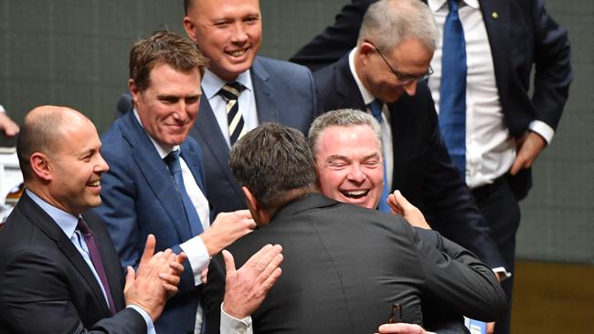 Minister for Defence Christopher PyneÂ hugs Shadow Minister for Defence Richard Marles after making his valedictory speech in the House of Representatives at Parliament House, in Canberra, Thursday, April 4, 2019. (AAP Image/Mick Tsikas) NO ARCHIVING