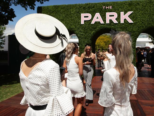 Racegoers enjoy the atmosphere at The Park on AAMI Victoria Derby Day. Picture: Matt King, Getty Images.