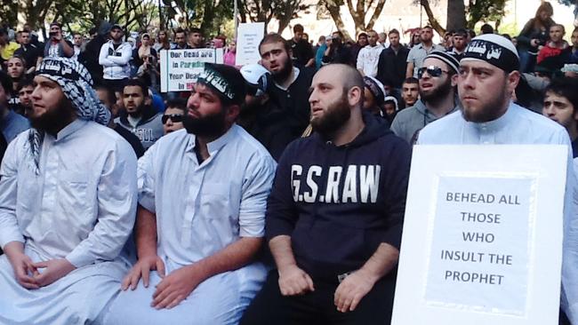 Protesters at Sydney’s Hyde Park in 2012 with posters bearing slogans such as ‘Behead all those who insult the Prophet’. Picture: AAP