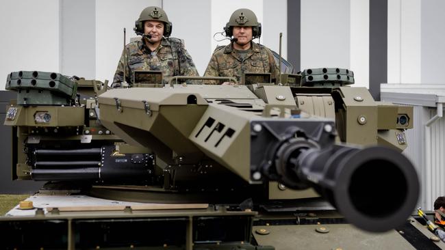 Chief of the German Army Lieutenant General Alfons Mais and Head of Equipment Department Ministry of Defence, Vice Admiral Carsten Stawitzki take a test drive of a Boxer Combat Reconnaissance Vehicle. Picture: Supplied