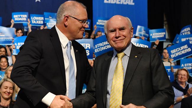 Former prime ministers Scott Morrison and John Howard. Picture: AAP