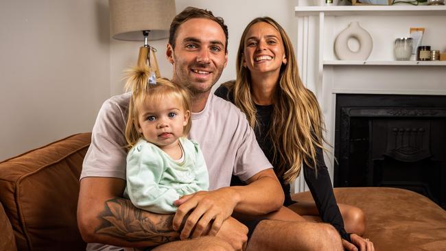 Port Adelaide star Jeremy Finlayson, his wife Kellie and their daughter Sophia. Picture: Tom Huntley