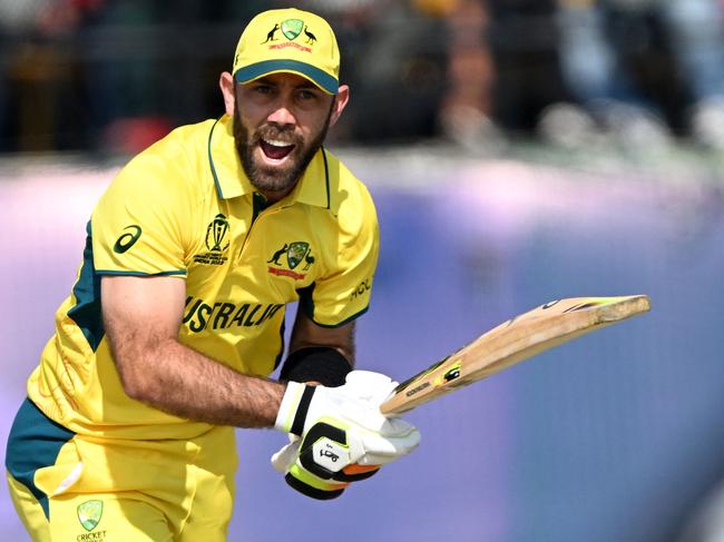 Australia's Glenn Maxwell reacts after playing a shot during the 2023 ICC Men's Cricket World Cup one-day international (ODI) match between Australia and New Zealand at the Himachal Pradesh Cricket Association Stadium in Dharamsala on October 28, 2023. (Photo by Arun SANKAR / AFP) / -- IMAGE RESTRICTED TO EDITORIAL USE - STRICTLY NO COMMERCIAL USE --