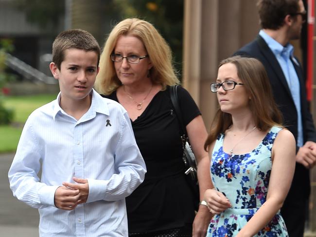 Det Insp Anderson’s wife Donna with son Cain and daughter Olivia at the Supreme Court for the sentencing of Mitchell and Fiona Barbieri. Picture: AAP Image/Dan Himbrechts