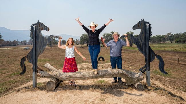 Towong mayor Andrew Whitehead, right members of the Man from Snowy River Bush Festival committee Jane Saxon, left, Jenny Boardman.