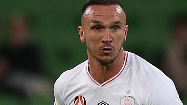 MELBOURNE, AUSTRALIA - MARCH 14: Tom Aldred of the Roar in action during the A-League match between Western United and the Brisbane Roar at AAMI Park, on March 14, 2021, in Melbourne, Australia. (Photo by Graham Denholm/Getty Images)