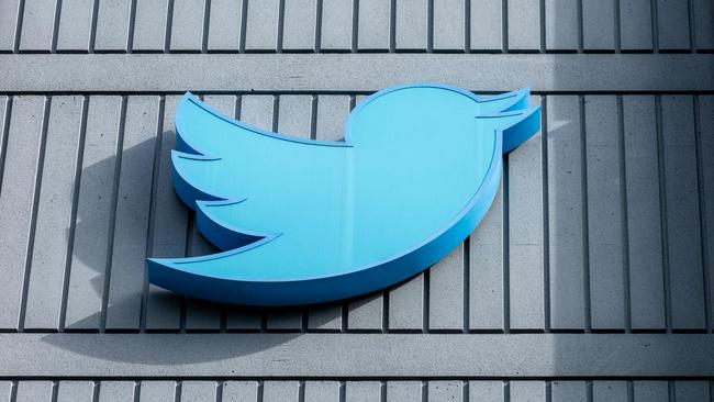 The Twitter logo is seen on a sign on the exterior of Twitter headquarters in San Francisco, California. Picture: AFP