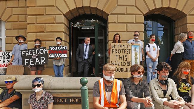 Labor MP David O'Byrne leaves state parliament as people protest against the anti-protest laws. Picture: Zak Simmonds