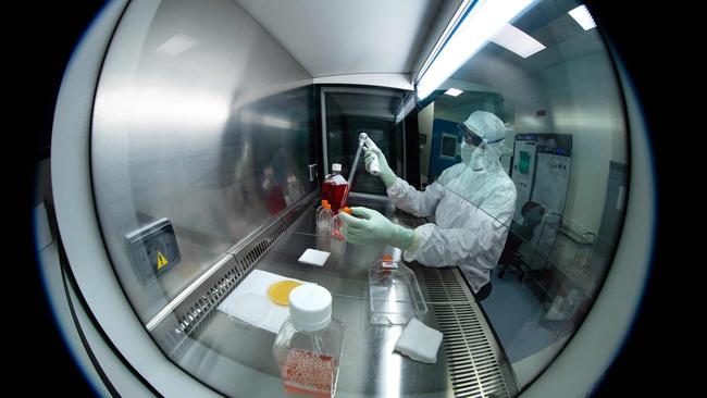 A lab technician performs tests at French pharmaceutical company Sanofi's laboratory in Val de Reuil. Sanofi will produce in France the Covid-19 vaccine of its US competitor Johnson &amp; Johnson in the second half of the year. Picture: AFP