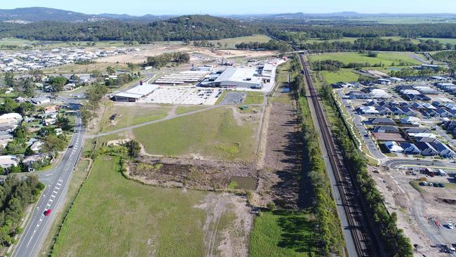 The block of land next to Pimpama City shopping centre that developer Norm Rix wants to put a train station on. Picture Glenn Hampson.