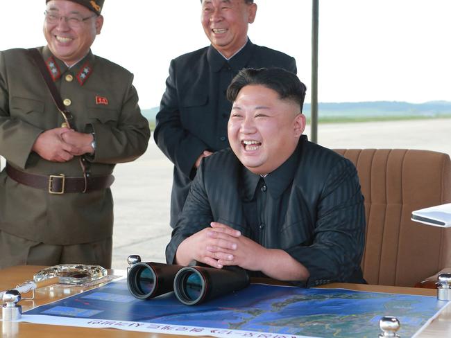 North Korean leader Kim Jong Un, attends what was said to be the test launch of an intermediate range Hwasong-12 missile at an undisclosed location. Picture: AP