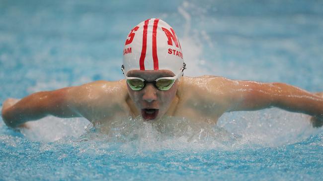 Jacob Samokhin of NUSWIM competes in the Boys 11 100m Butterfly.