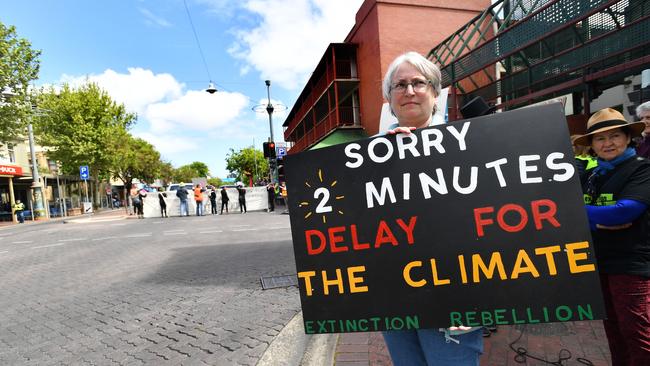 Activists from Extinction Rebellion participate in a protest in Gouger Street. Picture: AAP Image/David Mariuz