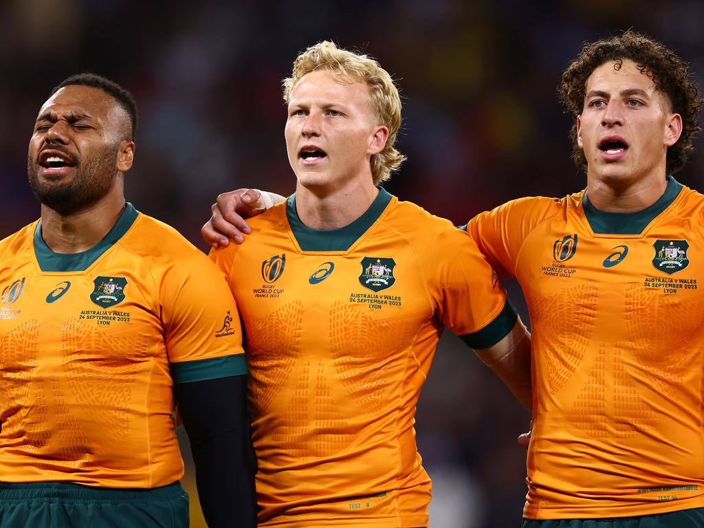 Carter Gordon (C) and Mark Nawaqanitawase (R) have both ditched rugby to play in the NRL. Picture: Chris Hyde/Getty Images