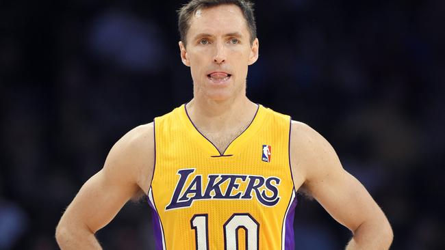 FILE - In this April 8, 2014, file photo, Los Angeles Lakers guard Steve Nash looks on during the first half of an NBA basketball game against the Houston Rockets in Los Angeles. The Lakers announced Thursday, Oct. 23, 2014, that Nash has been ruled out for the upcoming season with a back injury, putting the two-time NBA MVP’s career in doubt. (AP Photo/Mark J. Terrill, File)