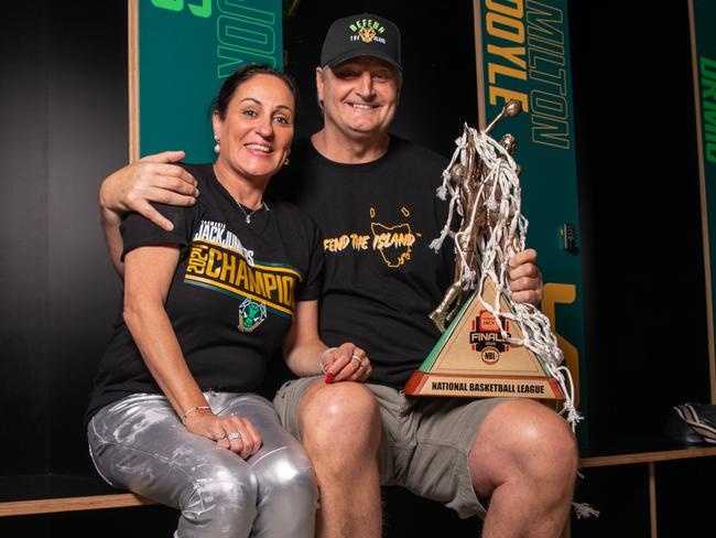 Tasmania JackJumpers CEO Christine Finnegan and Head Coach, Scott Roth with the NBL trophy. Picture: Linda Higginson/Tasmania JackJumpers