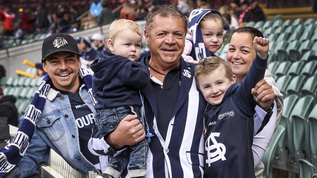 Brian Moon enjoys Father’s Day at the SANFL elimination final between South Adelaide and North Adelaide, with his children and grandchildren — son Brendon, daughter Nicole Symons, grandchildren Chase, 10 months, Bohdi, 4, and Hayley, 5. Picture: Sarah Reed