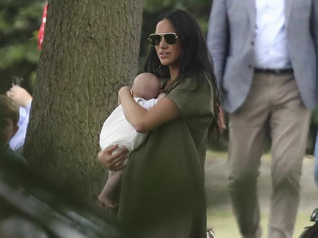 Trolls have again attacked Meghan over the way she held her son Archie at a polo event in the UK. Picture: AP