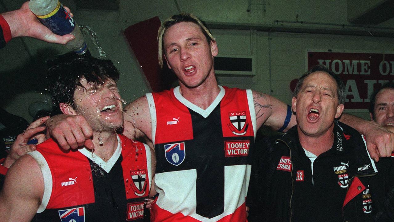 Stan Alves enjoys a win with Peter Everitt and Robert Harvey in 1998.