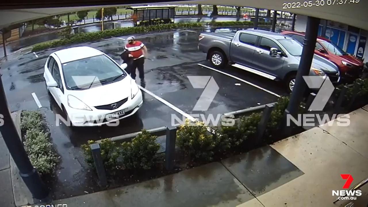 A man appears to inspect the vehicle. Picture: Channel 7