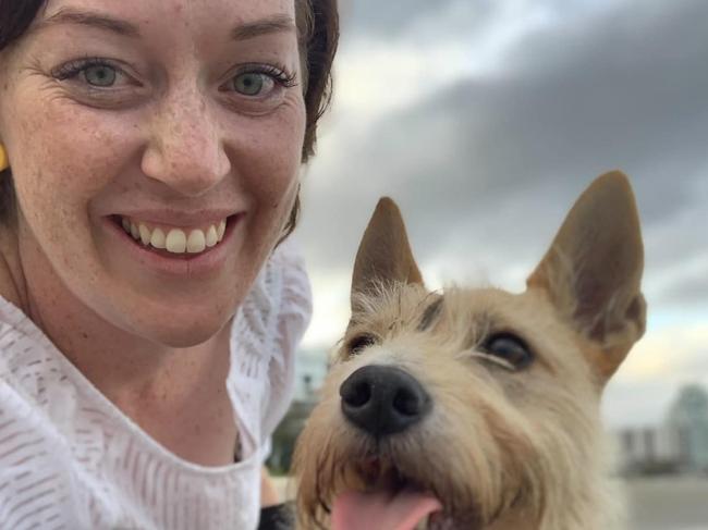 Jenna Schroeder in a picture with her dog that she posted on social media to mark International Dog Day.