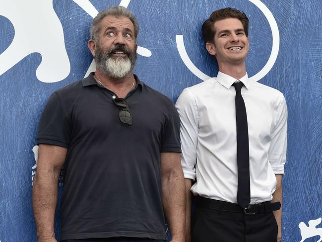 Director Mel Gibson and actor Andrew Garfield attend the photocall of the movie “Hacksaw Ridge” presented out of competition at the 73rd Venice Film Festival on September 4, 2016. Picture: AFP