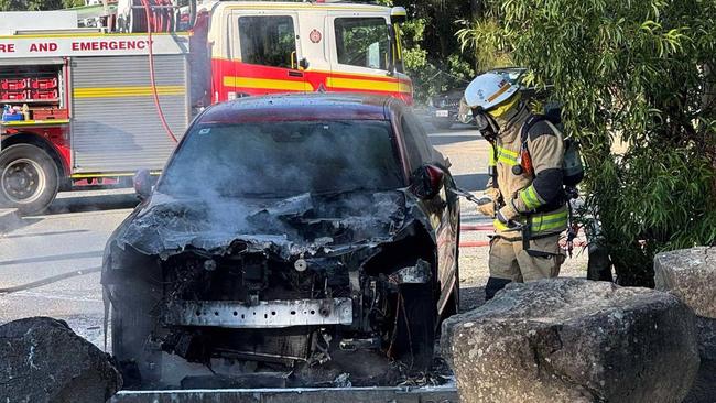 A red vehicle was destroyed after a car fire in Burleigh Waters. Picture: Supplied