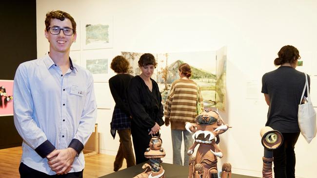 Jayden Peter, with his work 'My sentinels'. Photo: Mim Stirling