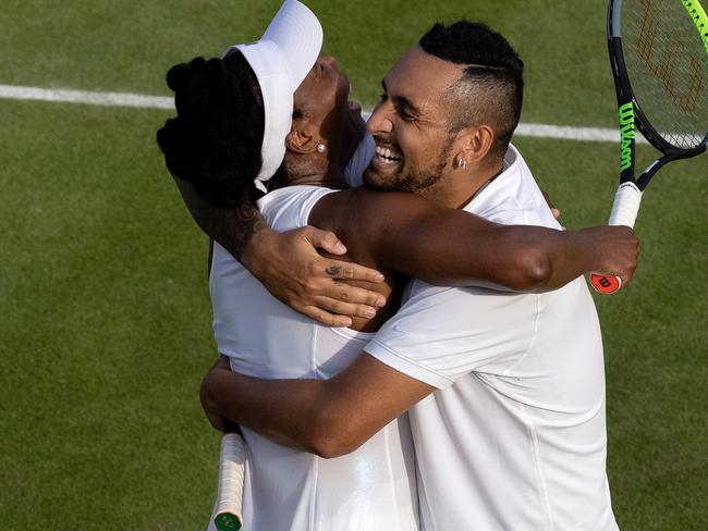 LONDON, ENGLAND - JULY 02:  Nick Kyrgios of Australia and Venus Williams of USA celebrate winning against Sabrina Santamaria and Austin Krajicek both of USA during their mixed doubles first round match on Day Five of The Championships - Wimbledon 2021 at All England Lawn Tennis and Croquet Club on July 02, 2021 in London, England. (Photo by AELTC/Ian Walton - Pool/Getty Images)