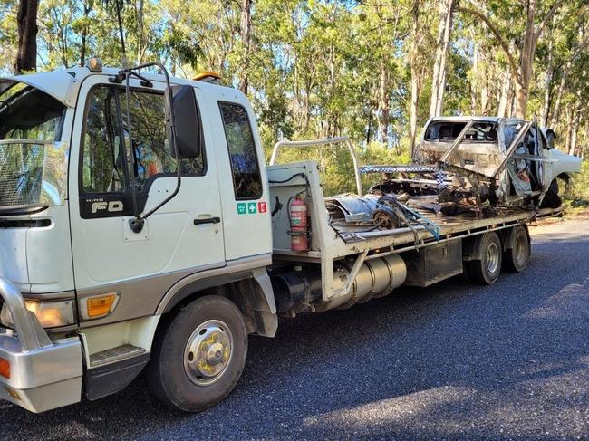 A car that crashed into a tree on Old Glen Innes Road on the weekend is taken by a TNT Towing truck away from the scene. Photo courtesy TNT Towing.