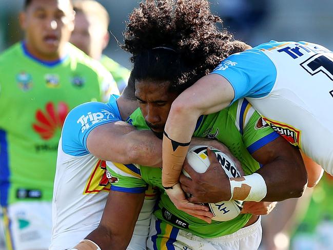 CANBERRA, AUSTRALIA - MAY 05: Iosia Soliola of the Raiders is tackled during the round nine NRL match between the Canberra Raiders and the Gold Coast Titans at GIO Stadium on May 5, 2018 in Canberra, Australia.  (Photo by Mark Nolan/Getty Images)