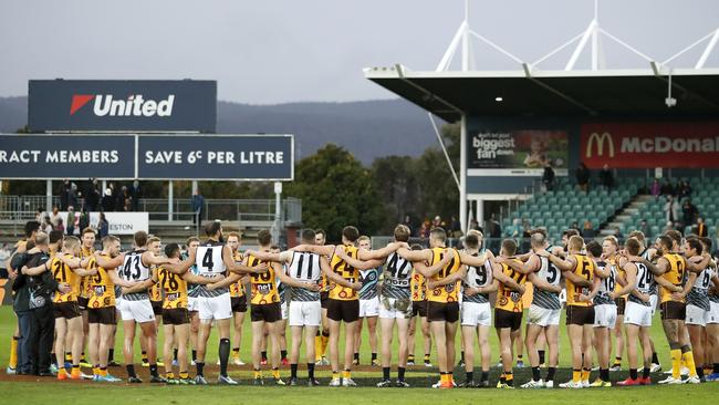 Hawthorn and Port Adelaide form a huddle after the 2019 round 10 match at UTAS Stadium in Launceston. Picture: DYLAN BURNS/AFL PHOTOS