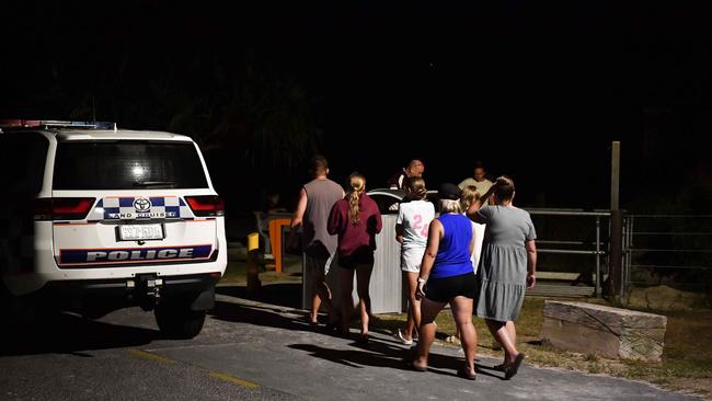 A teenage girl has died after being bitten by a shark off Bribie Island. Family and friends gather at the site. Picture: Patrick Woods.