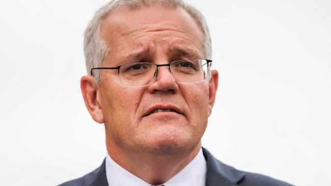 BRISBANE, AUSTRALIA - MAY 16: Prime Minister Scott Morrison speaks to the media at a press conference following a visit to Springfield Rise Sales & Information Centre, which is in the Blair electorate, on May 16, 2022 in Brisbane, Australia. The Australian federal election will be held on Saturday 21 May. (Photo by Asanka Ratnayake/Getty Images)