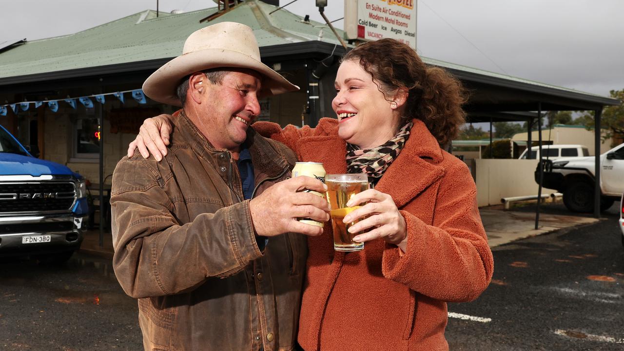 White Cliffs hotel owners Matt Young and Sarah Ker celebrate with a beer after their watering hole was recently named Best Bush Pub at the NSW Australian Hotels Association awards night. Picture: Toby Zerna