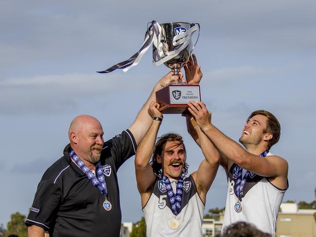 Grand final of the NEAFL between the Southport Sharks and the Sydney Swans at Fankhauser Reserve, Southport, on Sunday. Southport Sharks coach Stephen Daniel celebrates with captains, Andrew Boston and Seb (Sebastian) Tape Picture: Jerad Williams